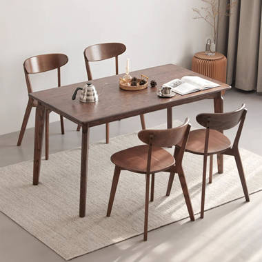 Solid walnut dining table best sale and chairs